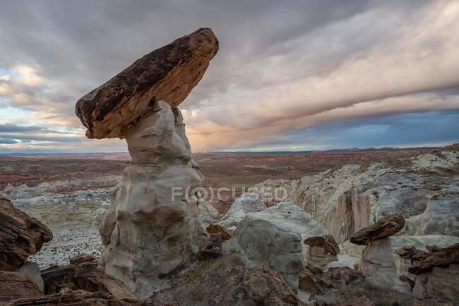 Storm cloud over rock formation, Grand Staircase-Escalante National Monument, Utah, USA — Stock Photo