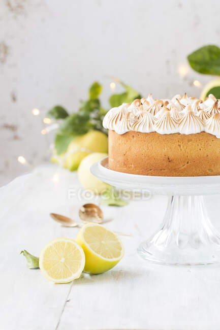 Lemon curd and Meringue Cake on a cakestand — Stock Photo