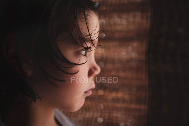 Portrait of a boy with wet hair after a bath — Stock Photo