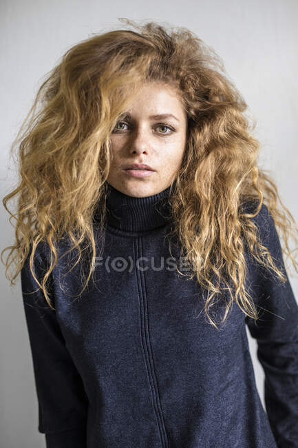 Portrait of a beautiful woman with big hair — Stock Photo