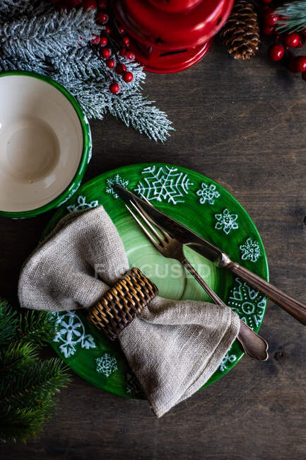 Christmas place setting on a wooden table — Stock Photo