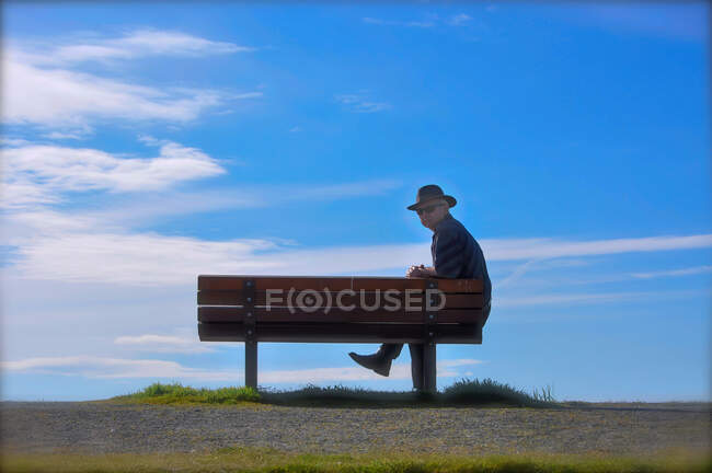 Portrait of a man sitting on a bench, Canada — Stock Photo