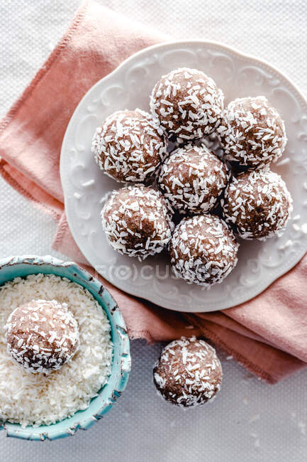 Coconut, nuts and dates energy balls — Stock Photo