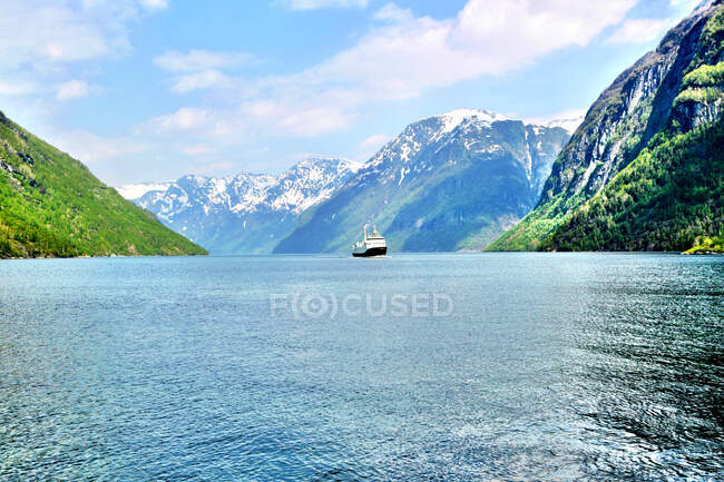 Ship sailing in Geirangerjford, More og Romsdal county, Norway — Stock Photo