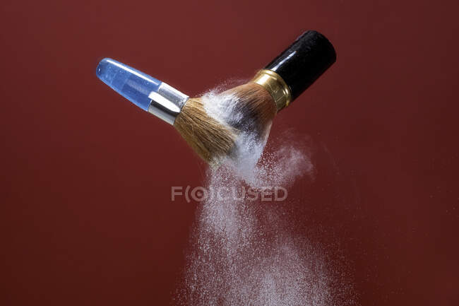 Two make-up brushes brushing against each other — Stock Photo