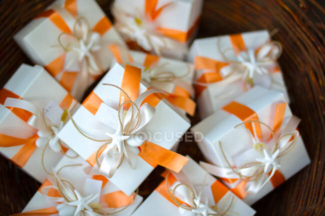 Close-up of boxed gifts in a basket — Stock Photo