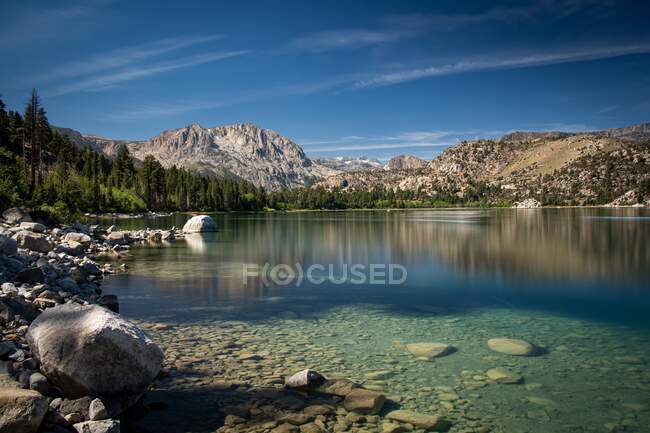 Mountain reflections in June Lake, Mono County, California, USA — Stock Photo