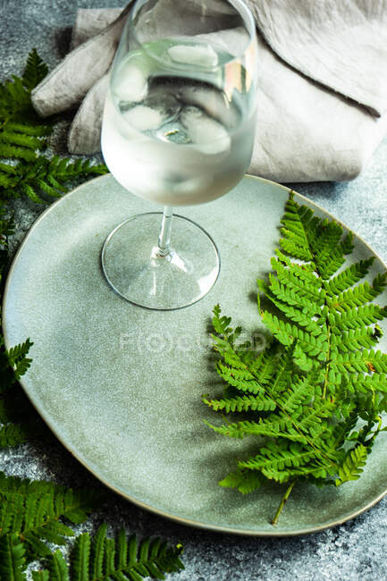 Rustic place setting and a glass of water — Stock Photo