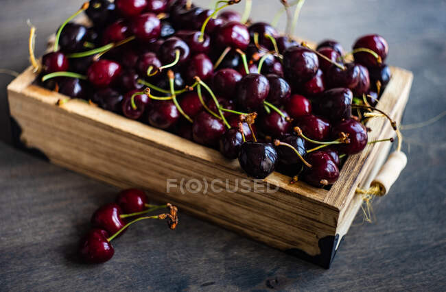 Box of fresh cherries — Stock Photo
