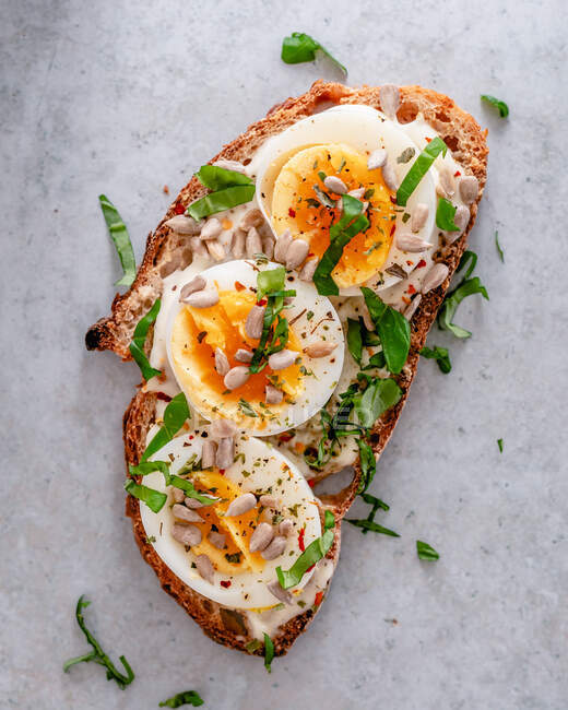 Egg mayonnaise toast with sunflower seeds — Stock Photo