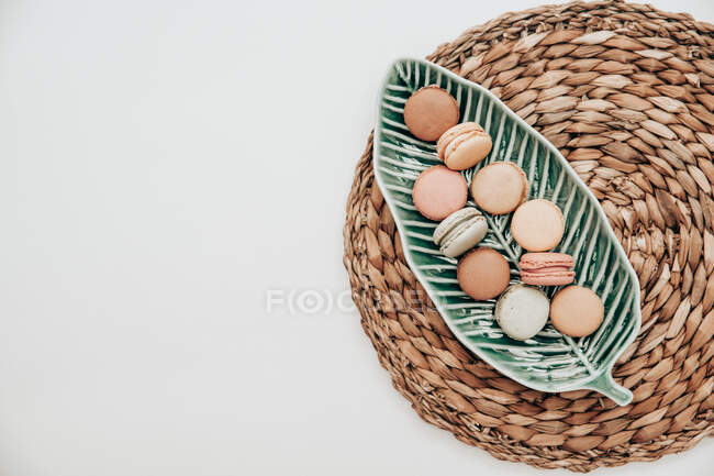 Macaroons on a leaf shaped dish — Stock Photo