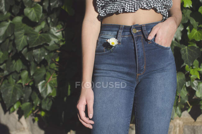 Close-up of a teenage girl with her hand in her jeans pocket, Argentina — Stock Photo