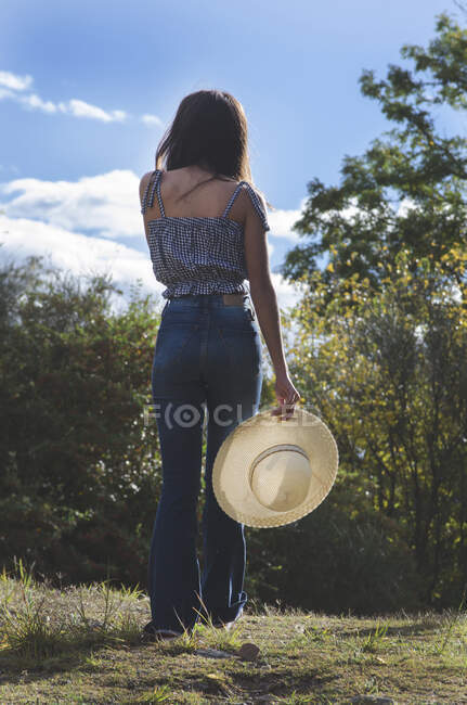 Teenage girl walking through woodland, Argentina — Foto stock