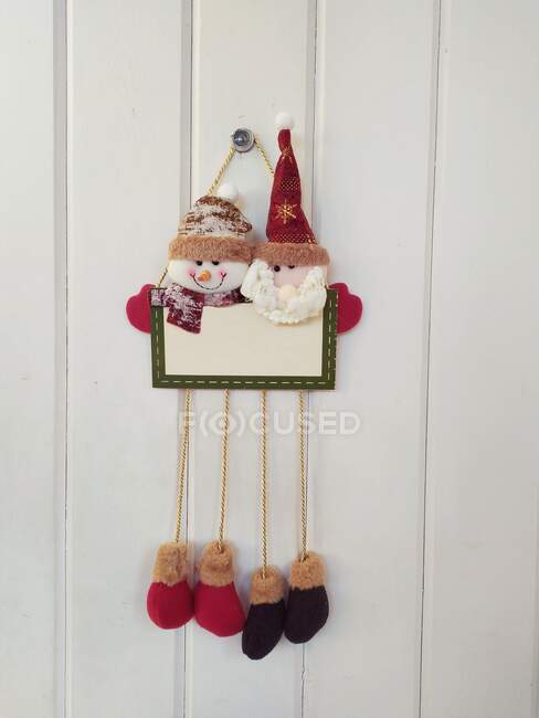 Christmas decoration hanging on a wall — Stock Photo
