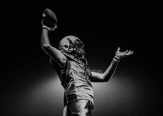 Portrait of a teenage boy playing American football, California, United States — Stock Photo