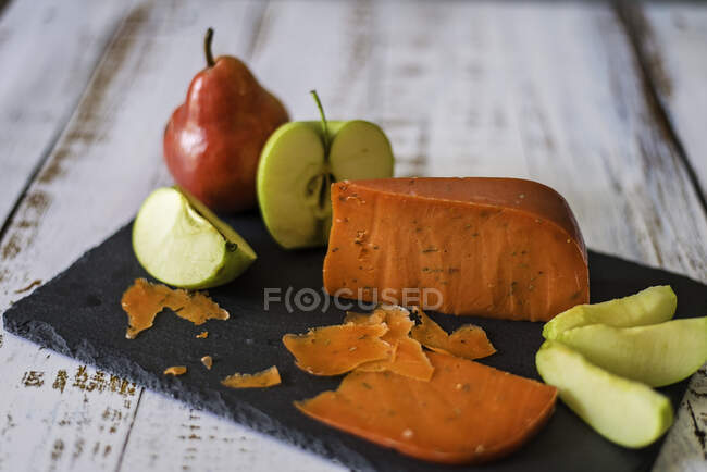 Cheese with apples and pears — Stock Photo