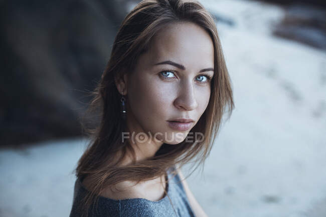 Portrait of a beautiful woman looking at camera — Stock Photo