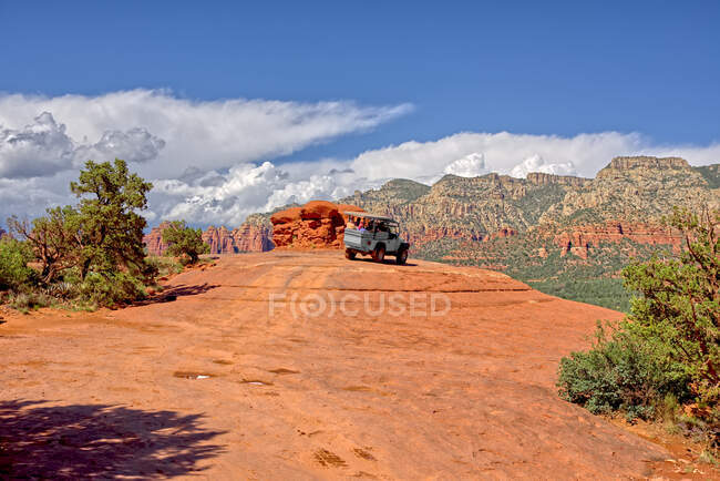 Scenic shot of Off Road Vehicle in canyon — Stock Photo