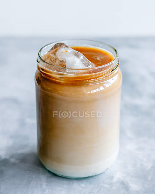 Glass jar of iced coffee — Stock Photo