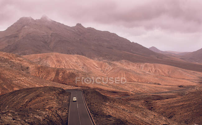 Car driving along a Mountain road, La Pared, Fuerteventura, Canary Islands, Spain — Stock Photo