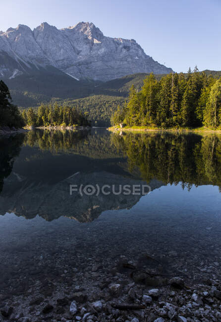 Mountain and forest reflection in Eibsee, Bavaria, Germany — Stock Photo
