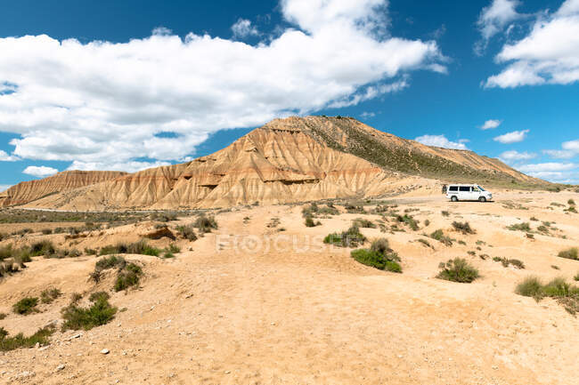 Van parked by a lake in Bardenas Reales, Navarre, Spain — Stock Photo