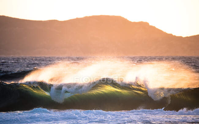 Waves breaking on beach, Corsica, France — Stock Photo