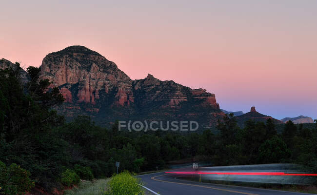Light trails in rural Sedona at dusk, Arizona, United States — Stock Photo