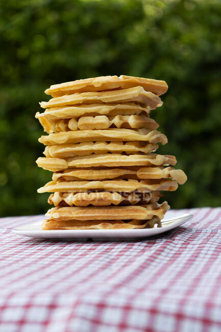 Stack of Belgian waffles on a table — Stock Photo
