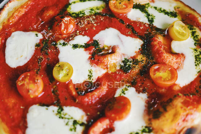 Fresh handmade stone baked margherita pizza — Stock Photo