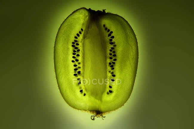 Close-up of a slice of kiwi fruit — Stock Photo