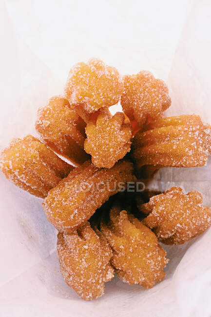 Bag of ten sugar cinnamon coated churros, Mexico — Stock Photo