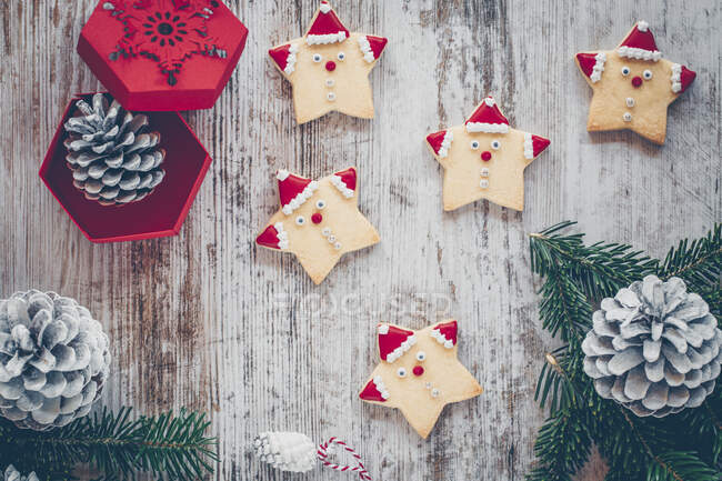 Christmas Santa cookies on a wooden table — Stock Photo