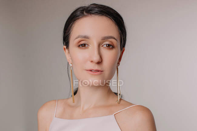 Beautiful woman with makeup looking at camera — Stock Photo