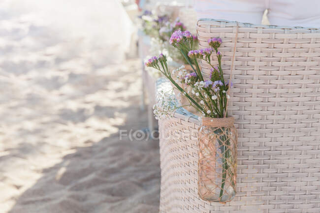 Close-up of flowers on a beach chair — Stock Photo