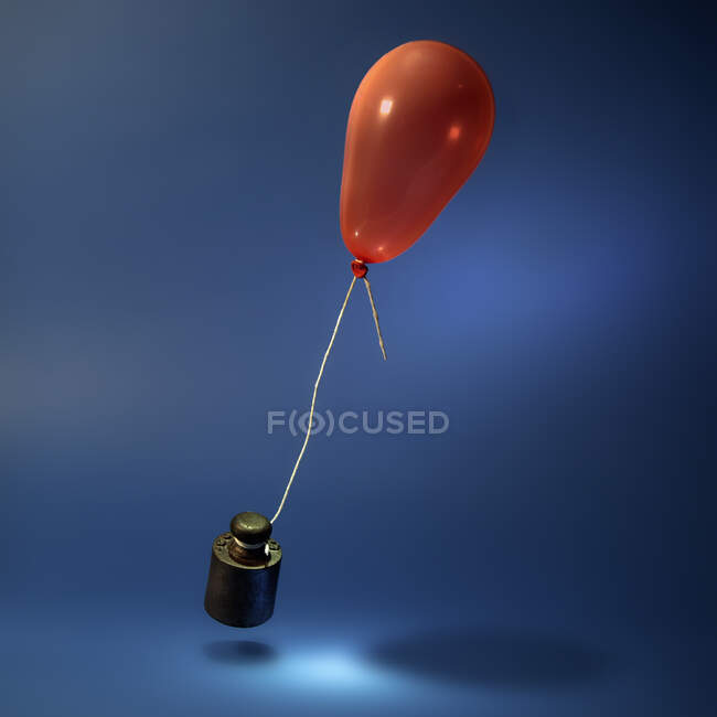 Representación 3d de un globo con un lazo rojo sobre un fondo azul - foto de stock