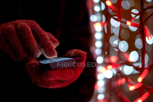 Woman with christmas lights in the car — Stock Photo