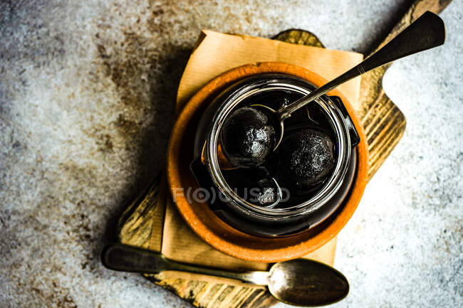 Overhead view of a jar of walnut jam — Stock Photo