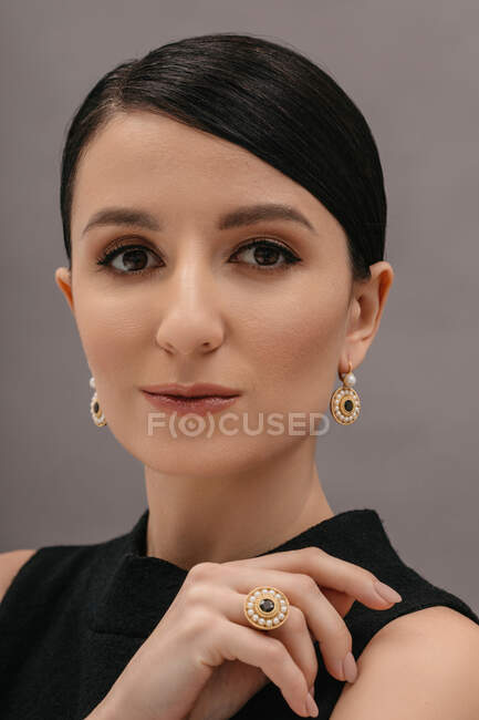 Portrait of a beautiful woman wearing jewellery set — Stock Photo