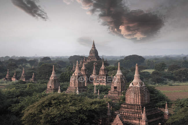 Stupas of ancient pagodas at sunrise, Bagan, Mandalay, Myanmar — Stock Photo