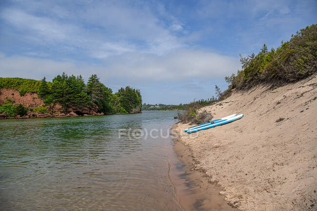 Two paddleboards by a river, Basin Head provincial park, Prince Edward Island, Gulf of St Lawrence, Canada — Stock Photo