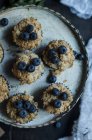 Pudding with oat crust and blueberries on top — Stock Photo